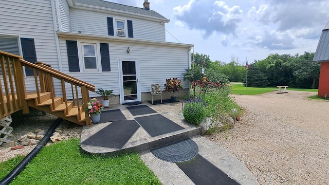 back of house with a patio