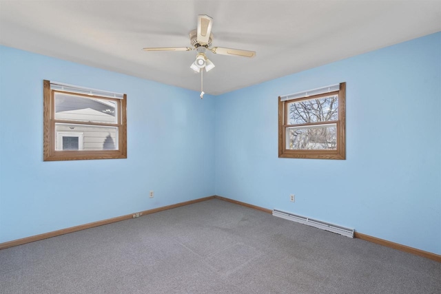 carpeted empty room with baseboards, baseboard heating, and ceiling fan