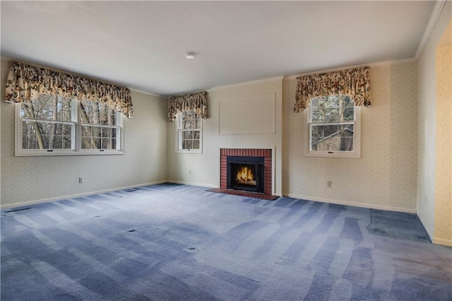 unfurnished living room with baseboards, wallpapered walls, and carpet