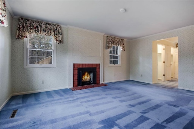 unfurnished living room with visible vents, wallpapered walls, ornamental molding, a brick fireplace, and carpet flooring