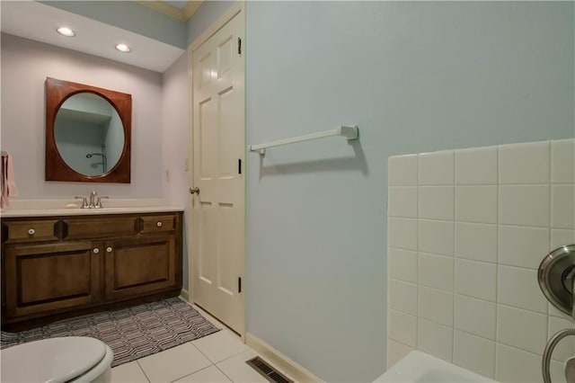 bathroom with visible vents, toilet, recessed lighting, tile patterned floors, and vanity