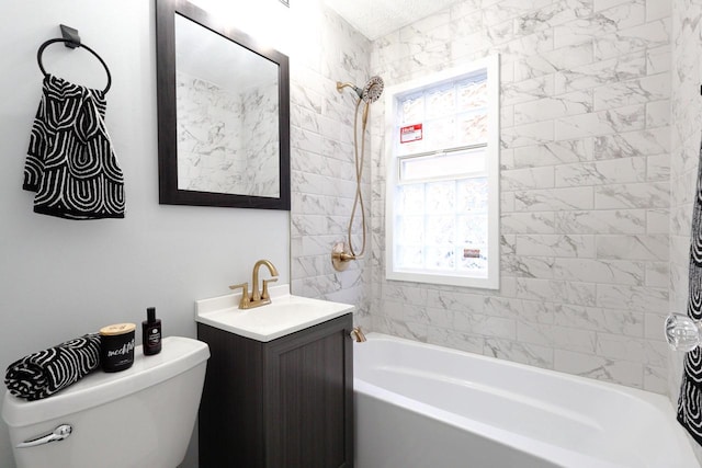 bathroom with vanity, toilet, and tub / shower combination