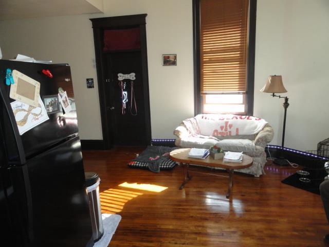 living area with wood finished floors