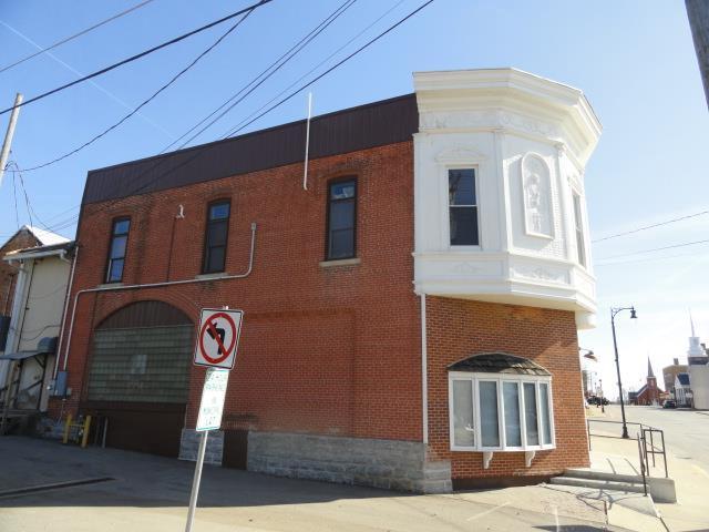 exterior space with brick siding