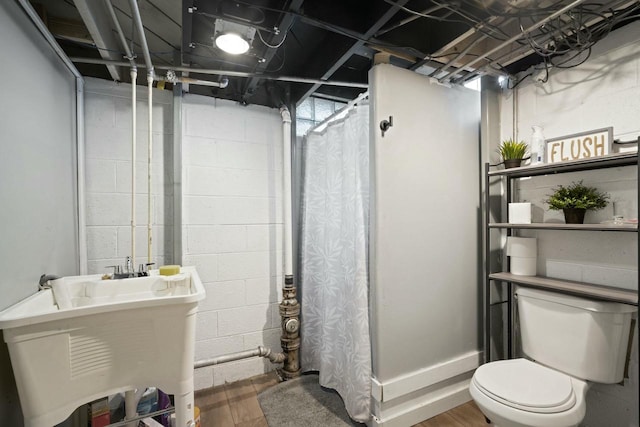 7514 32nd Ave, Kenosha, WI 53142 - full bathroom featuring toilet, a shower with shower curtain, vanity, and wood finished floors