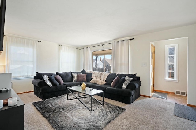 7514 32nd Ave, Kenosha, WI 53142 - carpeted living room with baseboards and visible vents