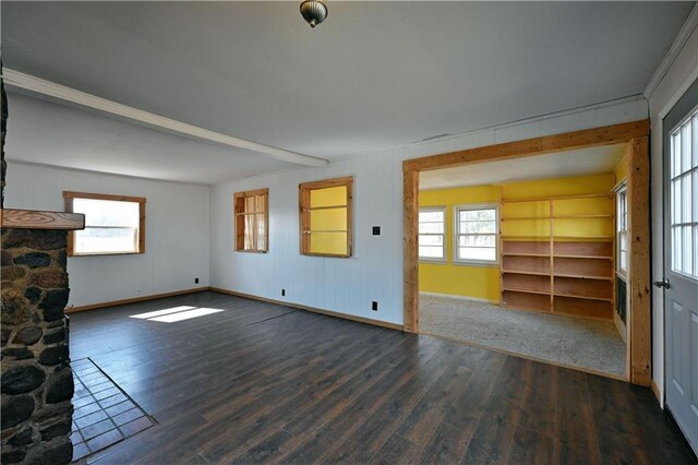 N7030 Little Valley Rd, Spooner, WI 54801 - unfurnished living room with plenty of natural light, baseboards, and wood finished floors