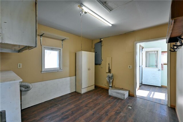 N7030 Little Valley Rd, Spooner, WI 54801 - interior space featuring electric panel, dark wood finished floors, and baseboards