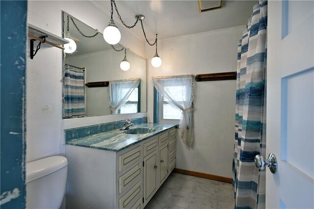 N7030 Little Valley Rd, Spooner, WI 54801 - bathroom with baseboards, toilet, a shower with curtain, marble finish floor, and vanity