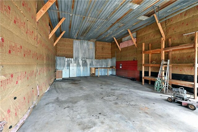 N7030 Little Valley Rd, Spooner, WI 54801 - miscellaneous room with a garage and unfinished concrete flooring