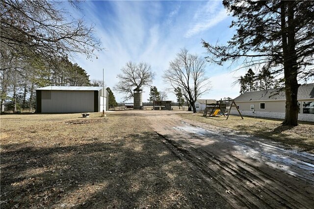 N7030 Little Valley Rd, Spooner, WI 54801 - view of road with dirt driveway