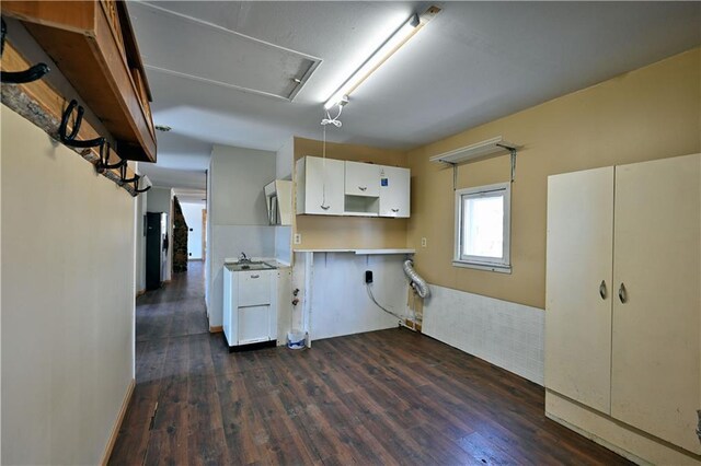 N7030 Little Valley Rd, Spooner, WI 54801 - kitchen with dark wood finished floors and white cabinetry