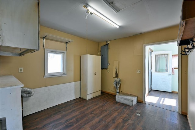 N7030 Little Valley Rd, Spooner, WI 54801 - interior space featuring electric panel, baseboards, and dark wood-style flooring