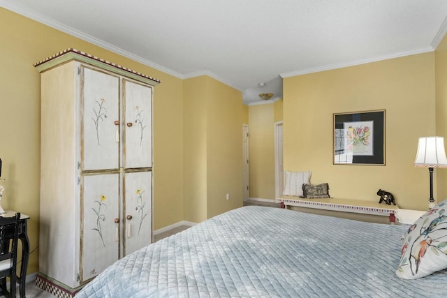 bedroom featuring crown molding and baseboards