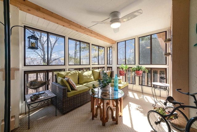 sunroom with a ceiling fan