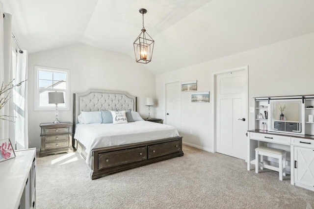 bedroom with light carpet and vaulted ceiling