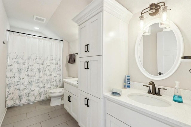 full bath with visible vents, toilet, a shower with shower curtain, vaulted ceiling, and vanity