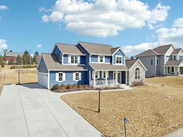 view of front of house featuring stone siding, covered porch, concrete driveway, a shingled roof, and a garage