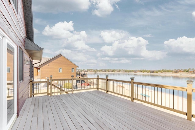 deck featuring a water view