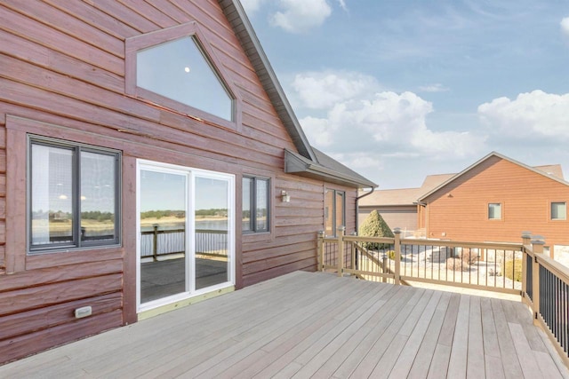 deck featuring a water view