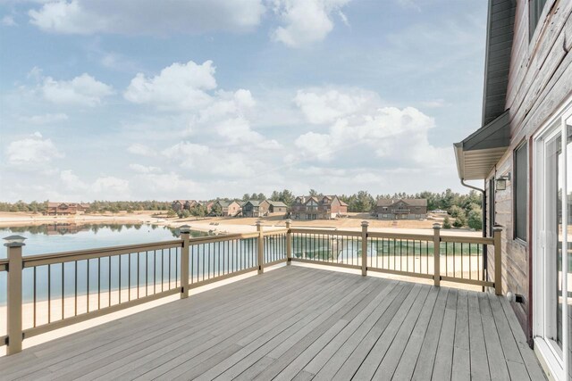 deck featuring a water view