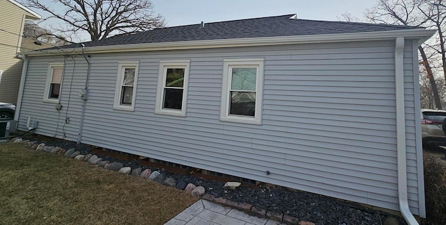 view of home's exterior featuring a lawn