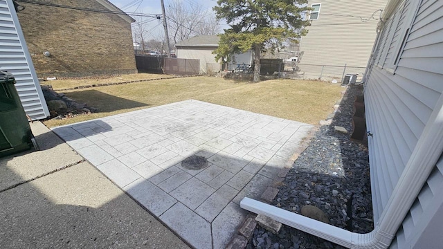 view of patio / terrace featuring fence