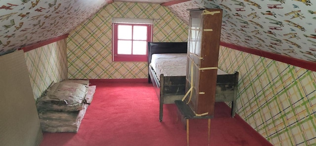 bedroom featuring wallpapered walls and carpet