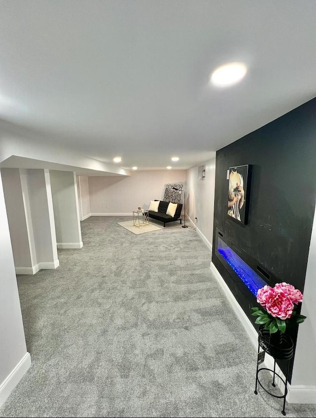 finished basement with carpet flooring and baseboards