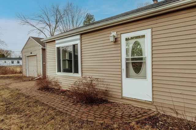 view of side of property featuring an attached garage