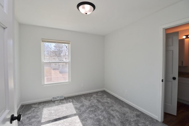 interior space with visible vents, baseboards, and carpet