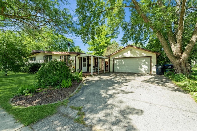 ranch-style house featuring a garage