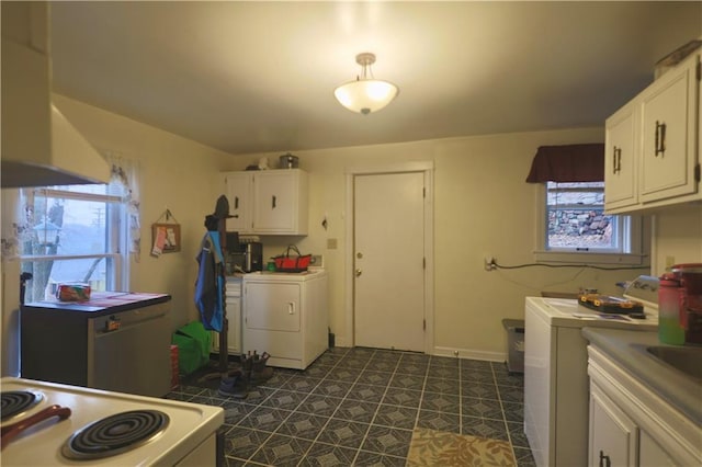 kitchen featuring baseboards, washer / clothes dryer, white range with electric cooktop, and white cabinetry