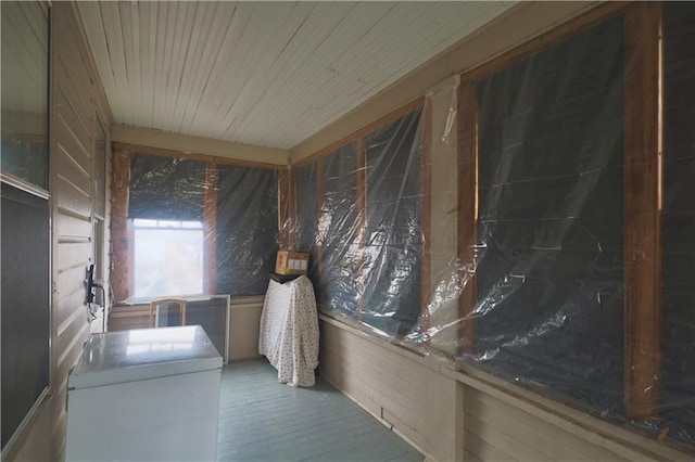 laundry area with laundry area and wooden ceiling