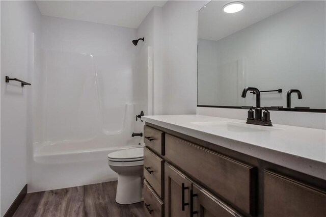 3557 114th St, Chippewa Falls, WI 54729 - full bath with shower / tub combination, wood finished floors, vanity, and toilet