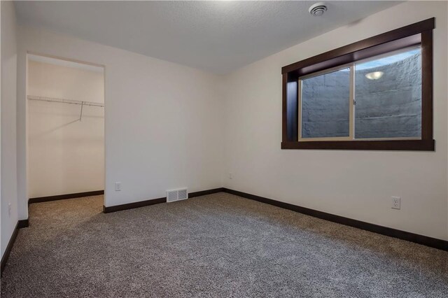 3557 114th St, Chippewa Falls, WI 54729 - unfurnished bedroom featuring visible vents, carpet flooring, and baseboards