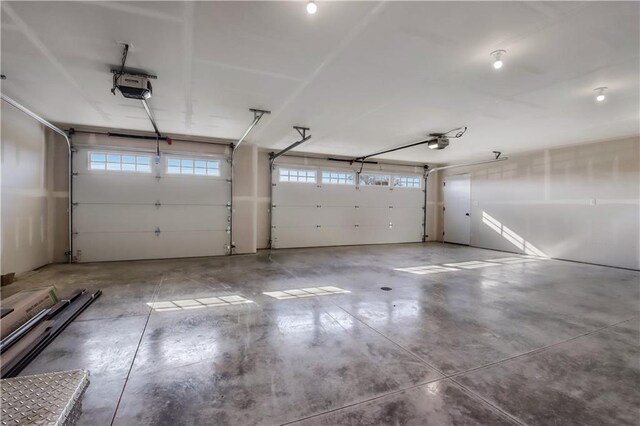 3557 114th St, Chippewa Falls, WI 54729 - garage featuring a garage door opener