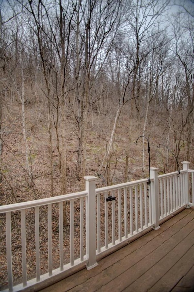 deck featuring a wooded view