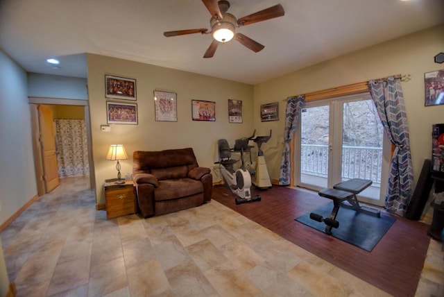 workout room with a ceiling fan