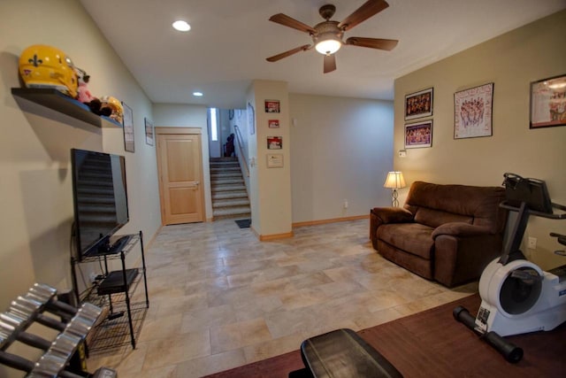 living room with stairs, recessed lighting, baseboards, and ceiling fan