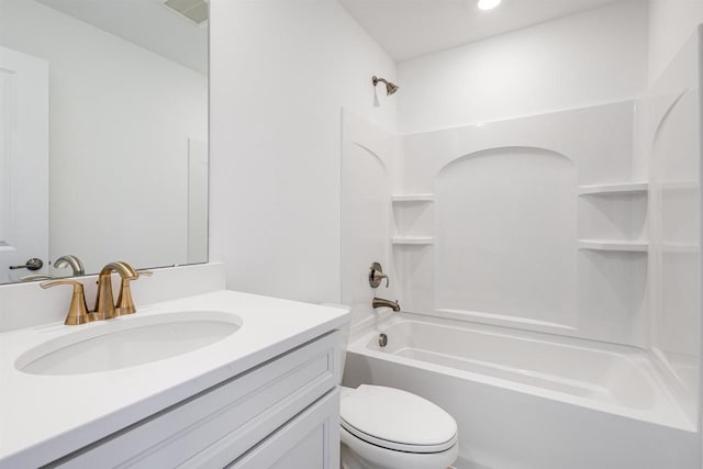 full bathroom featuring shower / bath combination, toilet, and vanity