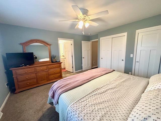 carpeted bedroom featuring baseboards and ceiling fan