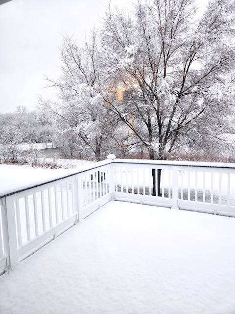 view of snow covered deck