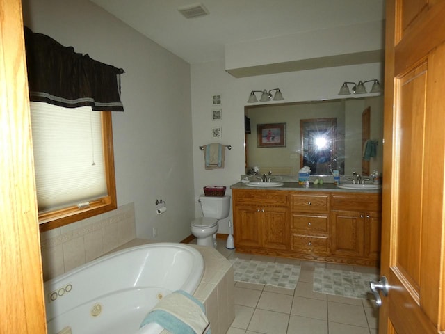 full bath with a sink, visible vents, toilet, and a tub with jets