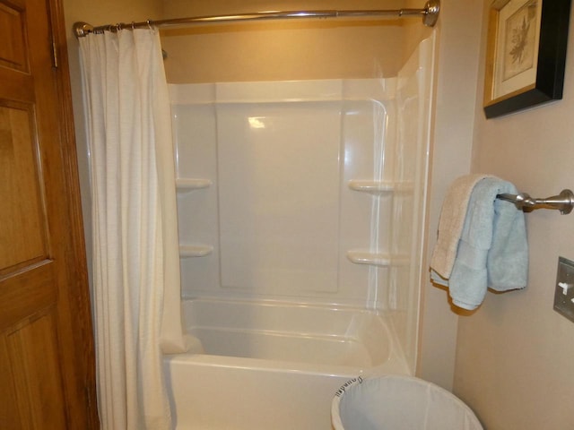 full bath featuring shower / bathtub combination with curtain