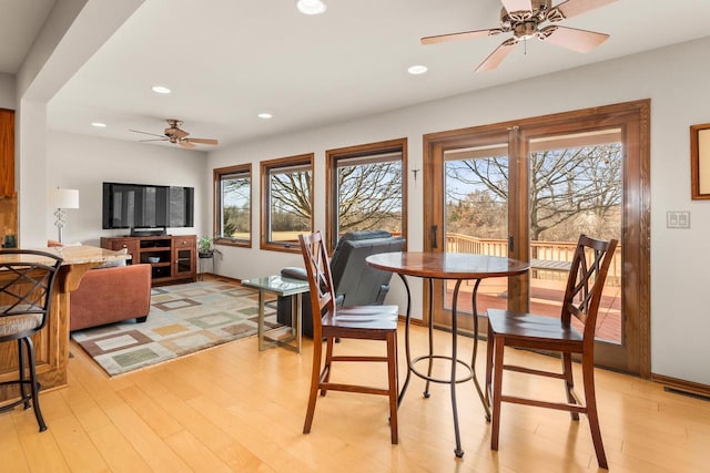 dining room with visible vents, baseboards, ceiling fan, recessed lighting, and light wood-style flooring