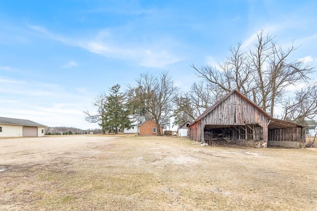 N402 24th Ave, Neshkoro, WI 54960 - view of yard with an outbuilding and a detached garage