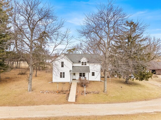 N402 24th Ave, Neshkoro, WI 54960 - view of front facade featuring a front lawn and roof with shingles