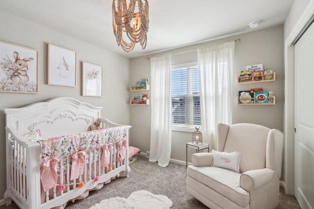 6109 Misty Bridge Rd, Madison, WI 53718 - bedroom featuring baseboards, a closet, a crib, and carpet