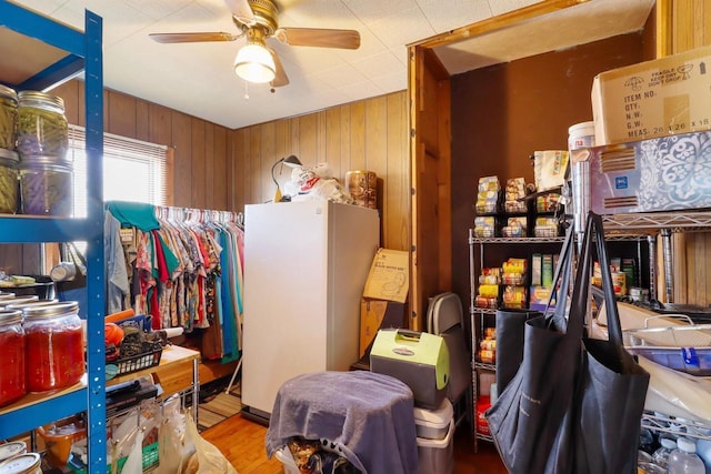 523 State Highway 73, Nekoosa, WI 54457 - interior space featuring wooden walls, ceiling fan, and wood finished floors